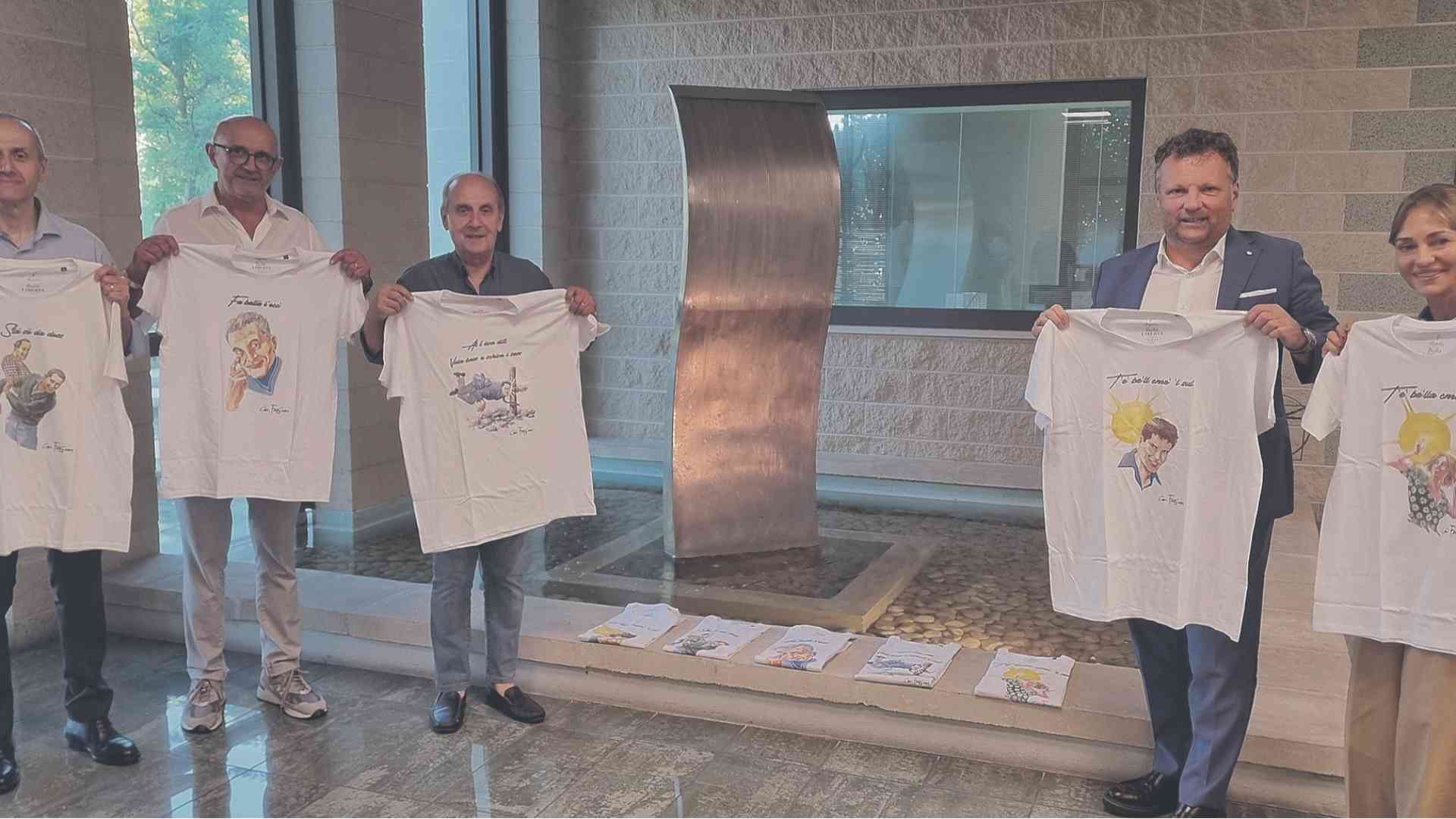 T-shirt dialettali a fin di bene: «Già a un terzo del cammino»